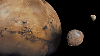 Photos of Mars as compared to its moons Phobos and Deimos.